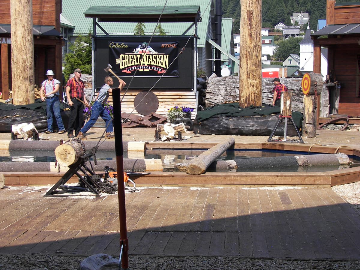 The arena of the Great Alaskan Lumberjack Show, with its climbing poles and log pond