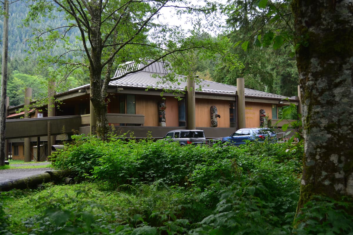 The Totem Heritage Center building among trees in Ketchikan