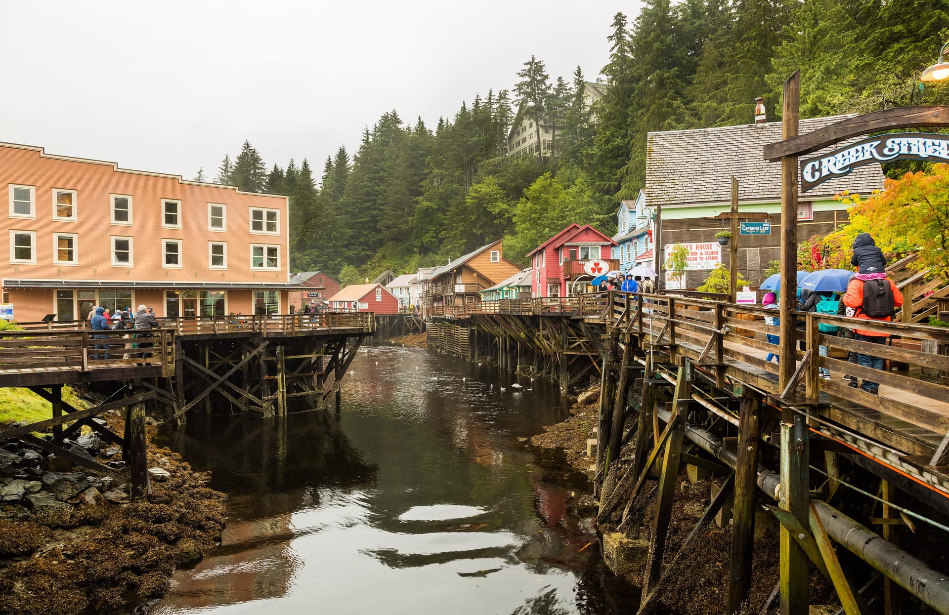 Wooden houses on stilts along the Creek Street boardwalk above Ketchikan Creek, Alaska